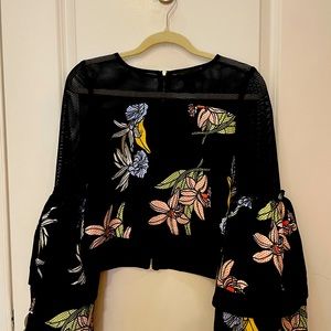 Beautiful black too with flowy sleeves and gorgeous print flowers.